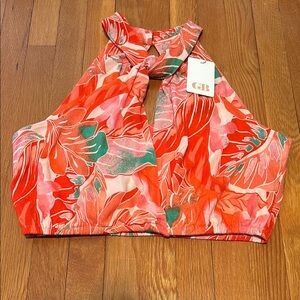 NWT GB Gianni Bini halter style crop top in orange multi tropical pattern